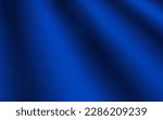 Small photo of Navy blue silk satin. Dark elegant luxury abstract background with space for design. Shiny smooth fabric. Soft folds. Drapery. Color gradient. Lines. Wavy pattern. Christmas, birthday, romance.