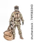Small photo of Soldier standing with duffel bag studio shot