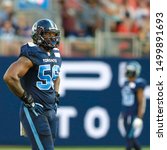 Small photo of Toronto, Canada - Aug 1, 2019: Toronto Argonauts Defensive lineman Freddie Bishop (56) catching his breath plays during Winnipeg Blue Bombers at Toronto Argonauts game at BMO Field in Toronto