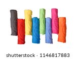 Row of colorful rolled clothes isolated over white background