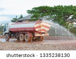 Water Truck Sprays Water For A...