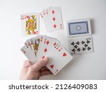 Small photo of Gin Rummy the winning hand with the deck , discard pile and second player cards