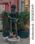 Small photo of Dublin, Ireland, November 13, 2021: A staue of the the Thin Lizzy lead Singer Phil Lynett in Dublin City Centre our side a bar where he used to play.