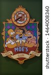 Small photo of Jundiai, Sao paulo, Brazil - July 25, 2019: Simpsons frame, Moe's bar, Duff beer and a clock. Carpe sum Duff