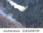 Small photo of Fire on the Panarotta. Sant'Orsola Terme, Italy on July 23, 2022. In action firefighters with Canadair and helicopter intervene in wildfire broke out in the Lagorai mountain range. Canadair