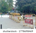Small photo of Bengaluru /India, July 18, 2020, Barricades put across busy street roads in south bengaluru Banashankari area temporary close down of city to prevent people moving in vehicles, COVID 19 pandemic.