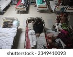Small photo of Dhaka Bangladesh 18 august 2023.Bangladeshi child dengue patients covered with a mosquito net suffers from dengue fever as they receive treatment mugda Medical College Hospital .