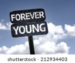 Forever Young sign with clouds and sky background 