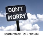 Don't Worry sign with clouds and sky background 
