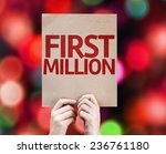 First Million card with colorful background with defocused lights