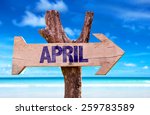 April Wooden Sign With Beach...