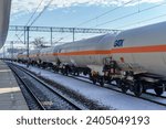 Small photo of Trzebinia, Lesser Poland, Poland - 30 November 2023: rail tankers for propane gas from GATX, a company that leases railcars in Europe, standing at the railroad station in Trzebinia