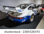 Small photo of Le Mans, France; October 10, 2023: Rear view of the spectacular Porsche 911 model 964 Turbo S LM GT from 1993 at the Le Mans museum
