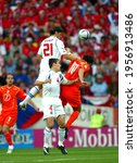 Small photo of AVEIRO, PORTUGAL - JUNE 19, 2004: Tomas Ujfalusi and Ruud van Nistelrooij in ation during the UEFA Euro 2004 Netherlands vs Czech Republic at the Estadio Municipal de Aveiro.
