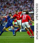 Small photo of LISBON, PORTUGAL - JUNE 21, 2004: Tomo Sokota and Steven Gerrard in action during the UEFA Euro 2004 Croatia vs England at the Estadio da Luz.