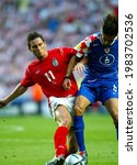 Small photo of LISBON, PORTUGAL - JUNE 21, 2004: Frank Lampard and Boris Zivkovic in action during the UEFA Euro 2004 Croatia vs England at the Estadio da Luz.