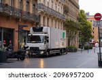 Small photo of Toulouse, France - June 2021 - A Renault, refrigerated delivery truck run errands to local businesses early in the morning, in the shopping street of Rue Alsace-Lorraine, in the historic city centre