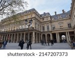 Small photo of Paris, France - April 2022 - Place Colette and the "Galerie du Theatre-Francais" (French Theatre Gallery), which surround the wing of the Palais-Royal (Royal Palace) that houses the "Comedie francaise