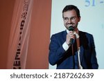 Small photo of Chalons-en-Champagne, France - April 2022 - Emmanuel Renoud, jurist at the CEDH (ECHR in English) and legislative candidate for Reconquete, Eric Zemmour's party, speaks at a meeting amid the campaign