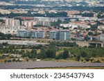 Small photo of Toulouse, France - July 21, 2023 - View from Pech-David Hill: Poudrerie factory below the cliff, solar farm in Oncopole, Papus business center, residential buildings in Lafaourette, Bagatelle, Mirail