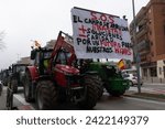Small photo of Huesca, Spain- 02-06-2024 - The discontent of the agricultural and livestock sector takes the streets of the city of Huesca with tractors and banners "S.O.S. the countryside is ruined, enough is enoug