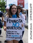 Small photo of SAN JOSE, COSTA RICA, AUGUST 31ST 2019: A march against the abortion legalization and gender ideology took place in the Plaza la Democracia, a protester holding a banner against abortion law but supp
