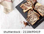 Cinnamon Babka or Brioche Bread. Swirl Bread, Homemade Pastry for Breakfast, White Background, Selected Focus 