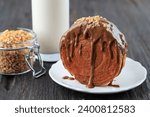 Small photo of Viral Dessert New York Roll Croissant Bomboloni Cromboloni with Chocolate Sauce and Chopped Peanut Topping