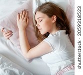 Young Woman Sleeping In Bed....