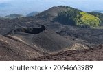 Small photo of Etna volcano, Sicily - September 19 2021: Tourist stand on the rim of a small crater on the slopes of the Etna volcano in Sicily. Tourism is up again after a short outburst of Etna earlier this month.