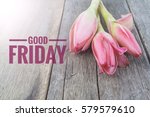 Concept vintage color on flower and wooden table with word GOOD FRIDAY