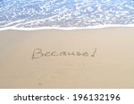 Small photo of Just because, a message written in sand at the beach.