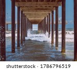 Waves Under The Wooden Pier On...
