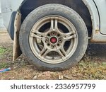 Small photo of Mumbai, Maharashtra - India: July 01, 2023, vehicle tyre, four wheeler tyre, three wheeler, truck tractor car taxi tyre, Mac wheel, drum, rubber tyre