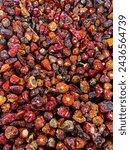 Small photo of Dried hot red chilies, whole raw red chili, Red hot chili pepper, Top view of dried chili peppers, close up