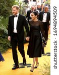 Small photo of London, United Kingdom-July 14, 2019: Prince Harry, Duke of Sussex and Meghan, Duchess of sussex attend The Lion King European Premiere at the Odeon Luxe in London, UK.