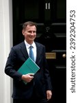 Small photo of London, united Kingdom - November 22, 2023: Chancellor Jeremy Hunt leaves 11 Downing Street to present the Autumn Statement to Parliament in London, England.