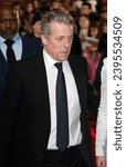 Small photo of London, United Kingdom - November 28, 2023: Hugh Grant attends the "Wonka" World Premiere at The Royal Festival Hall in London, England.