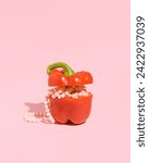 Small photo of Perl jewelry in red bell pepper, creative cooking, stuffed vegetable recipe.
