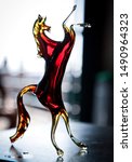 Red Glass Sculpture Of A Horse