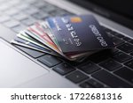 Small photo of Online credit card payment for purchases from online stores and online shopping, Credit card close up shot.