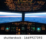 Cockpit view during a early morning flight over the alps