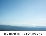 Horizon with Slovakian mountains (Mala Fatra) in the distance. Nature and good visibility. Clear blue sky during sunny weather as very large copy space area. 
