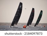 Small photo of Palma de Mallorca,Spain - July 26, 2022: Sled (1st), Platoon (2nd) and Quantum (3rd) passing the windward buoy on 52 SUPER SERIES Sailing Week hosted by Puerto Portals