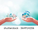 Corporate social responsibility (CSR) concept: Two human hand holding big city and earth globe over blurred blue nature background. Elements of this image furnished by NASA