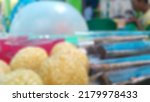 Small photo of Defocus abstract background of snacks at the wedding, consisting of boiled rice cake, jelly, and chocolate lunkhead.