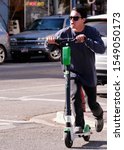 Small photo of Boise, ID/USA-11/03/19:Recent accidents between rental scooters and cars have caused some here to question their safety. Rental companies extol their benefits, city official remain unsure.