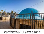 Small photo of The dome painted blue above the building inside is the tomb of Rabbi Shimon Bar Yochai in Meron-Israel
