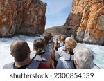 Small photo of Horizontal Falls ,Western Australia, Australia.07-17-21. Thrill seekers in boat about to cross through the narrow gap.
