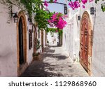 Narrow Street In Lindos Town On ...